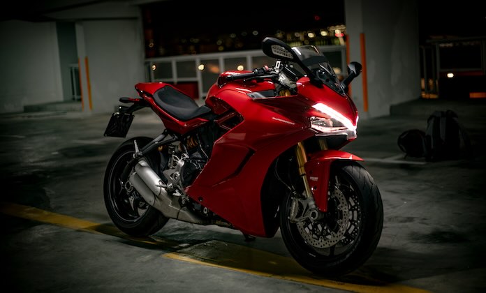 Red motorbike at night