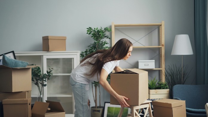 girl packing boxes